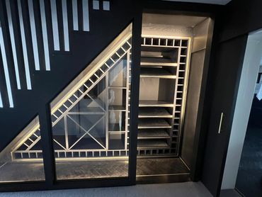 Wine rack made to fit under staircase
