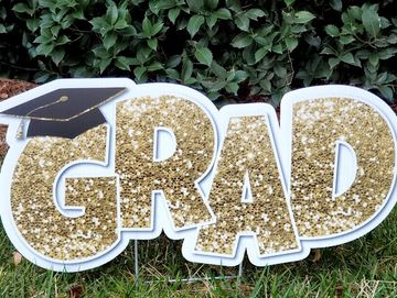 Yard Sign: Gold Glitter "Grad" with graduation cap yard card Cary NC