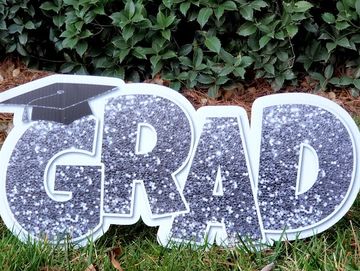 Yard Sign: Silver Glitter "Grad" with graduation cap yard card Apex NC