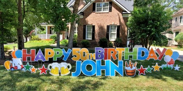 Rainbow Birthday yard signs Raleigh, birthday yard sign rental, big 50th happy birthday yard card