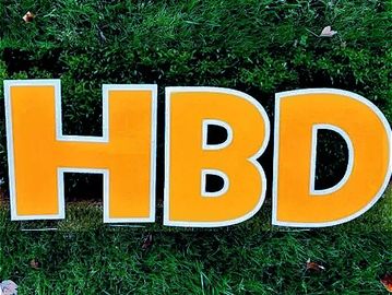 Yellow Happy Birthday yard card Cary NC