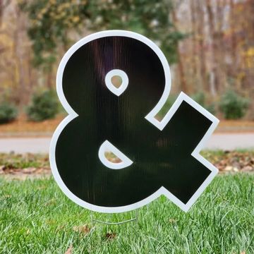 And character used for yard cards in Cary NC