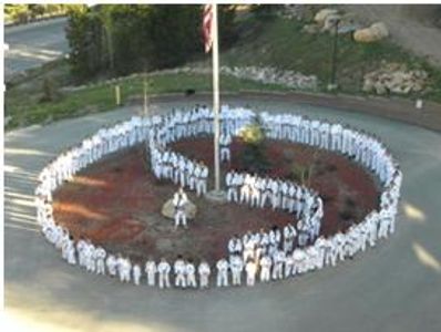 Martial arts symbol lined up by teen martial arts school.