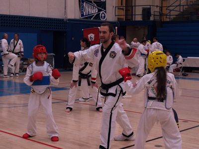 Kids karate students at taekwondo tournament