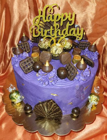 Purple Themed birthday Cake, with Chocolate toppings