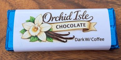 Orchid Isle Chocolate bar with dark chocolate and coffee flavor in blue wrapper.