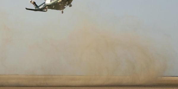 A139 desert landing possible brown out due to sand, flight safety assessment.