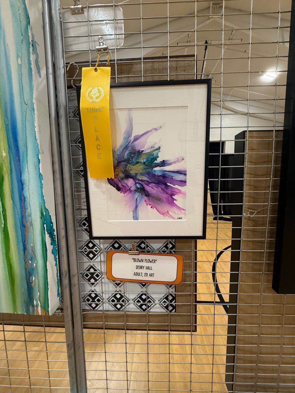 Abstract watercolor artwork titled "Blown Flower" by Debby Hall, awarded third place.