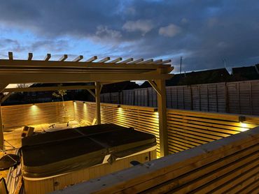 Lighting in outdoor spa area.