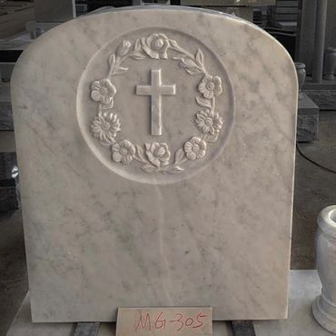 McCarthy Granite custom carved tombstone and vase.