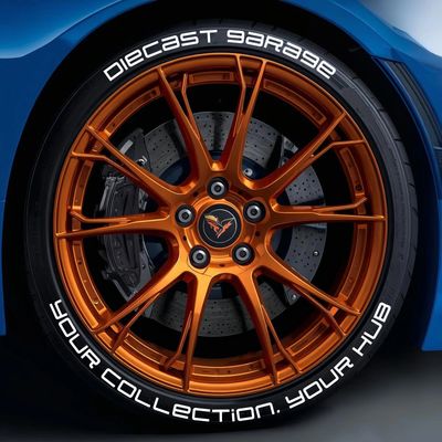 Diecast Hub logosunun yer aldığı turuncu jantlı spor araba tekerleği