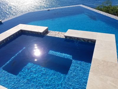 Five Star Pools, Inc. Blue Hydrazzo Pool Plaster Interior Negative Edge Kohala Coast Pool