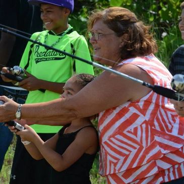 Thanks to great sponsors we can give out fishing poles and teach the kids how to fish and cast