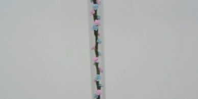 Walking cane with pink and blue silk roses. Available in 29" through 36" length. 
