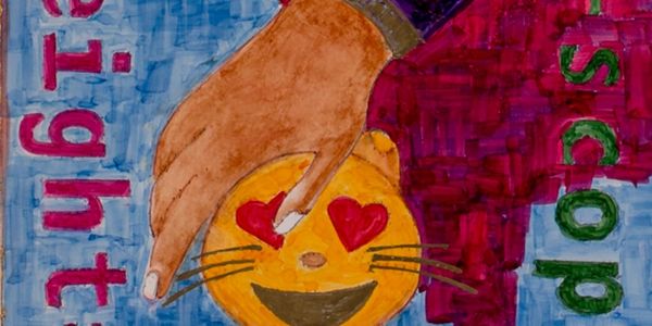 Emoji of smiling cat