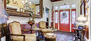The vestibule welcomes you with awards from all over the world at The Inn of the Patriots.