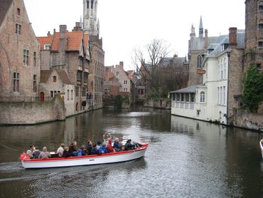Riding canals in Brugge to the church, where THE NUN'S STORY, showcased Audrey Hepburn.