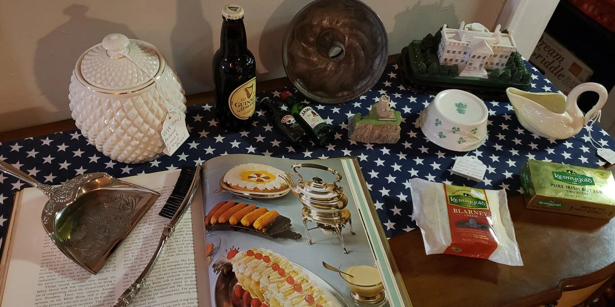 Assorted Irish items are shown of foods and china including cheese and butter from Kerry Gold.
