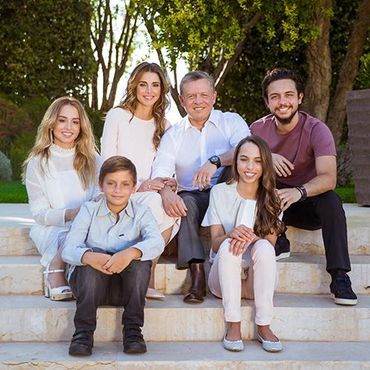 King Abdullah II (center), Crown Prince Abdullah, Queen Rania, and family.
