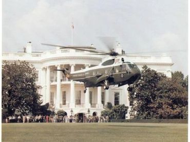 Marine One lands on the South Lawn of the White House.
