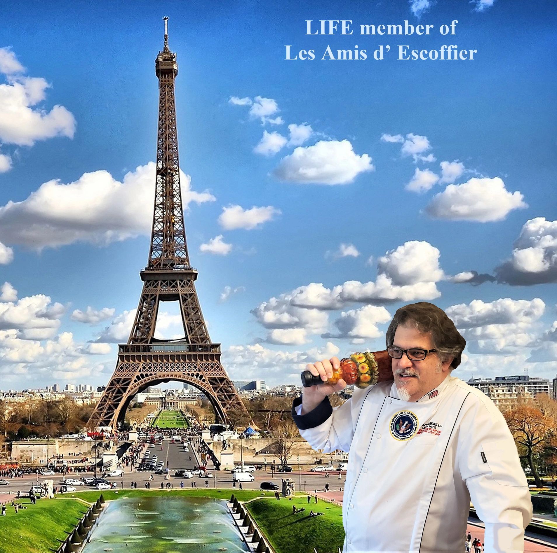 A photograph of Chef Marti Mongiello at the Eiffel Tower in Paris, France.