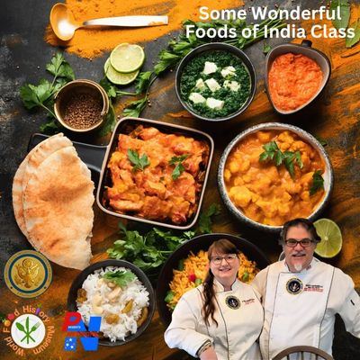 A picture of Chefs Marti and Stormy Mongiello with Indian foods behind them.
