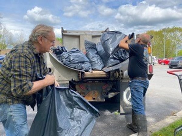 loading bags of garbage