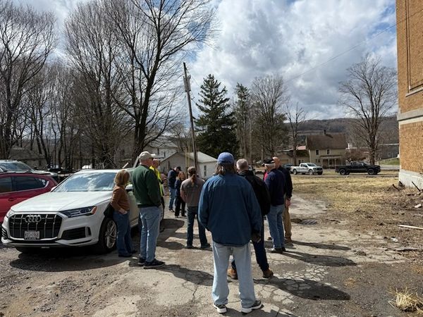 Construction contractors asking questions about the project.