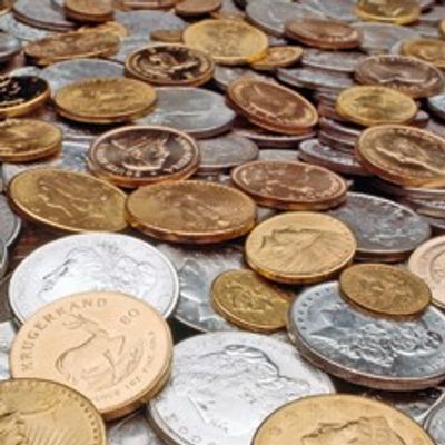 Gold and Silver Coins in a large group