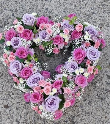 Heart shaped wreath sent as sympathy flowers for a funeral in York