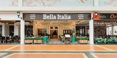 Facade of Bella Italia restaurant in a shopping mall.