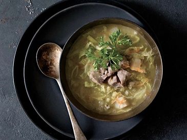 A bowl of Scotch Broth from Outlander Kitchen II by Theresa Carle-Sanders.