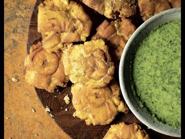 Green Plantain Tostones with cilantro-based Mojo dipping sauce from Castle Rock Kitchen cookbook.
