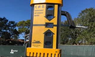 Laser grading equipment for athletic court construction