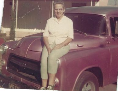 Lynn's mom, Alice, sitting on his '55 Dodge Panel Truck, before Lynn leaves cross-country road trip.
