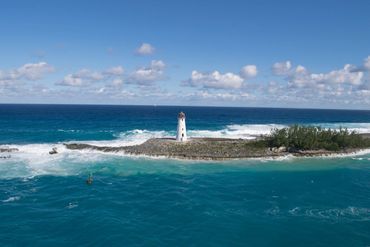 Lighthouse in Bahamas, cruise, ocean, water, clouds