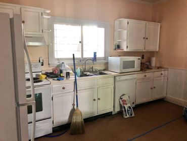 Kitchen: Before property transformation.