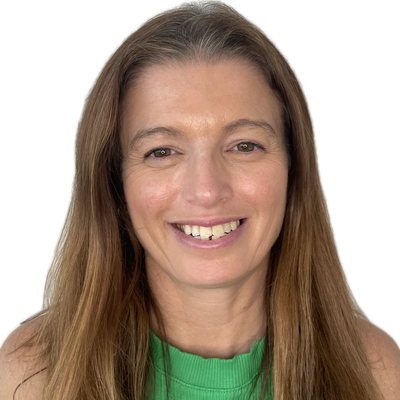 Smiling woman with long brown hair and a green top.