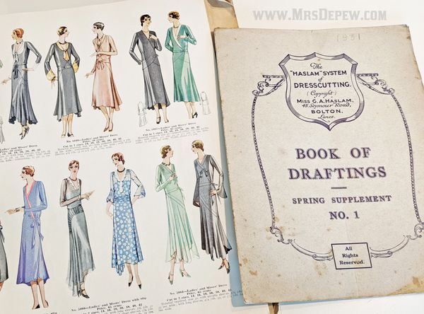 The Haslam System of Dresscutting original pattern supplement booklet. shown with a 1930s McCall Cat