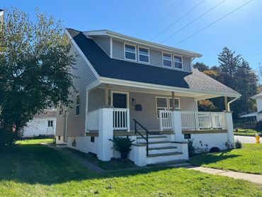 Vinyl siding with board and batten detail in Canton