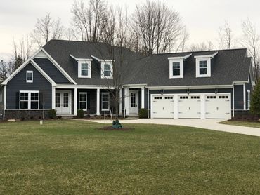 Northeast Ohio roofing and siding company installing replacement windows