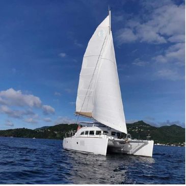 Sailing Vessel Scenic Route, a Lagoon Catamaran sails into Grenada.