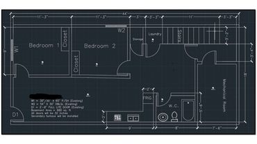 Blueprint of a basement floor plan with two bedrooms, laundry, mechanical room, and bathroom.
