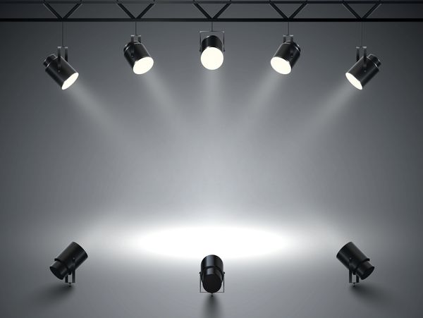 Spotlights with bright white light shining stage