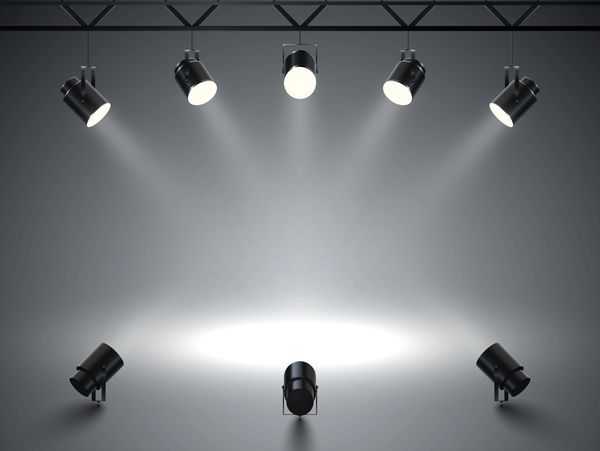 Spotlights with bright white light shining stage