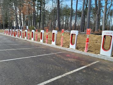 Tesla charging at Merchants Way