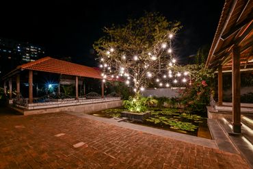 Night garden ambience at The Lily Pond wedding venue, Bangalore
