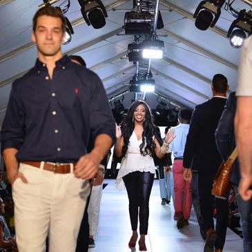 Models walking on a runway during a fashion show.