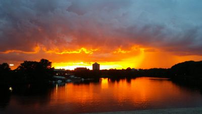 Sunset and clouds over a river