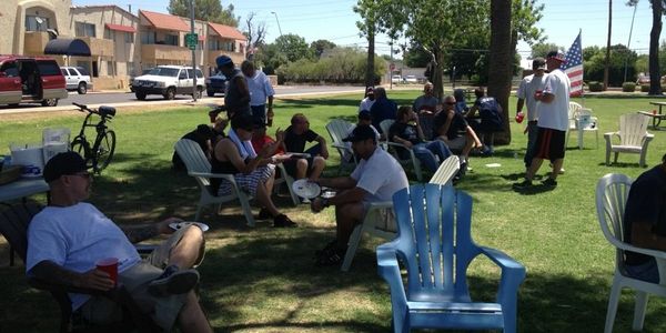 Residents have fun at The Mesa House transitional sober living houses for men in Mesa Arizona.